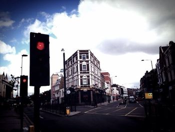 City street against cloudy sky