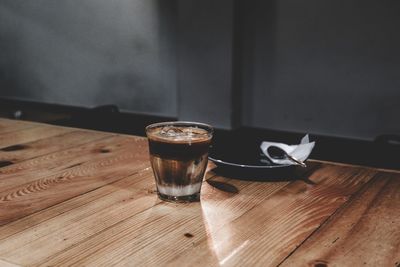 Drink glass on wooden table