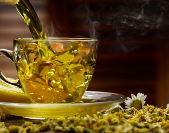 Close-up of tea in glass on table