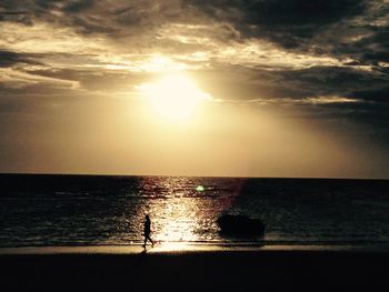 Scenic view of sea at sunset