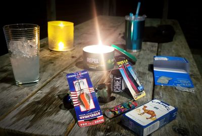 High angle view of tea light candles on table