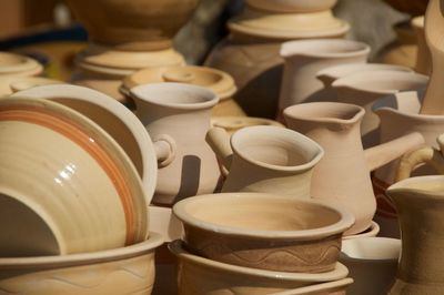 Close-up of ceramic jugs and bowls