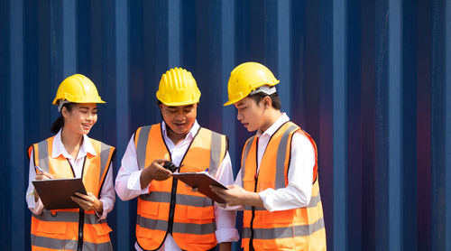 People working in traditional clothing