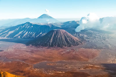 Panoramic view of volcanic landscape against sky