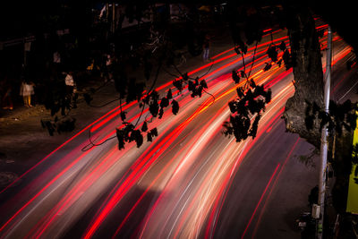 Long exposure of vehicles moving on road at night