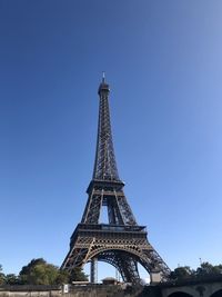 Low angle view of eiffel tower against blue sky in paris 