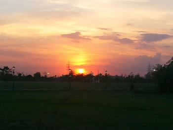 Scenic view of landscape at sunset