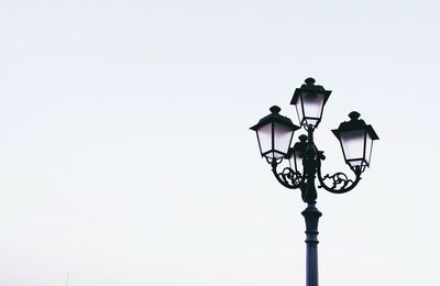 Low angle view of street light against clear sky