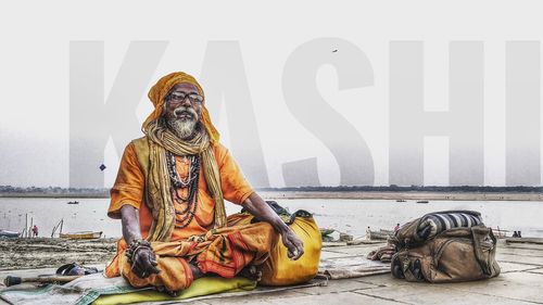 Statue of man sitting in temple