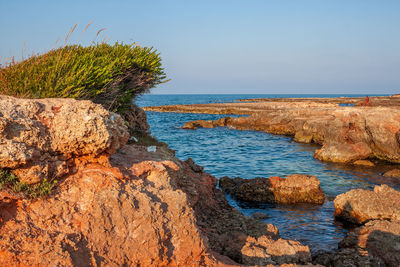 Scenic view of sea against clear sky