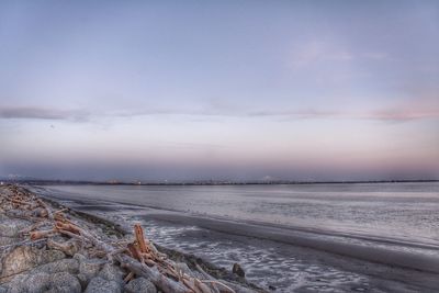 Scenic view of sea against sky during winter