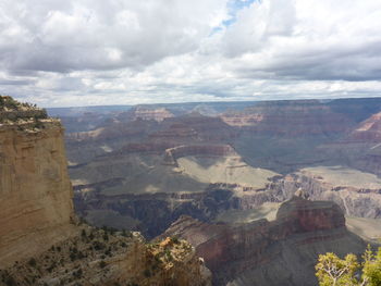 High angle view of mountain range against cloudy sky