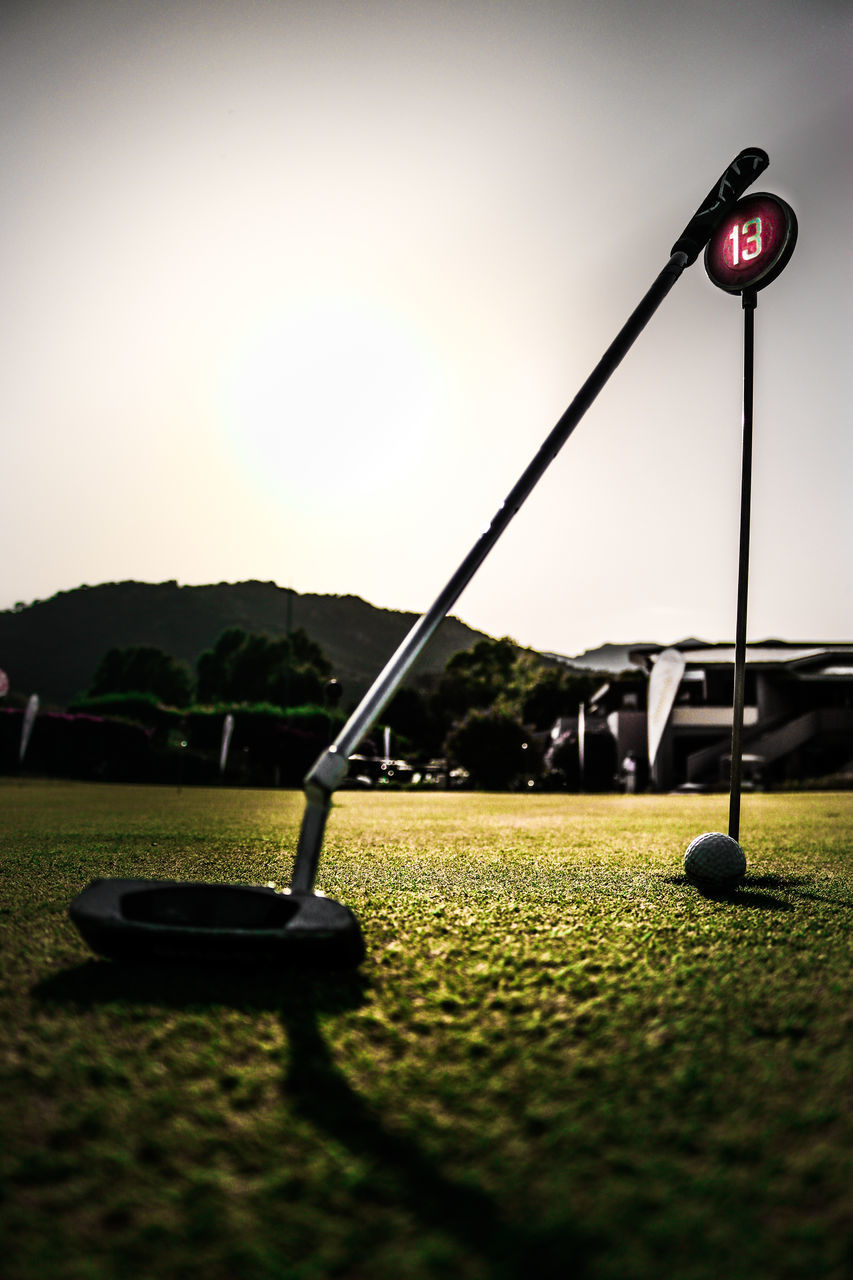 golf, golf course, light, grass, sky, sports, nature, no people, reflection, golf club, plant, green, golf ball, activity, sunlight, street light, leisure activity, day, outdoors, morning, ball