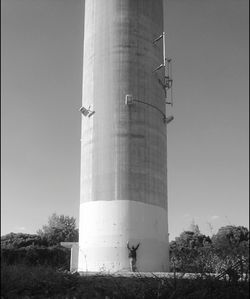 Low angle view of factory against clear sky