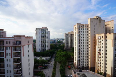 High angle view of street amidst buildings in city