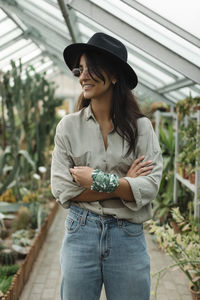 Woman in a greenhouse