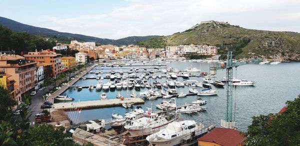 High angle view of boats moored in harbor