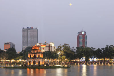 Turtle tower on hoan kiem lake at dusk