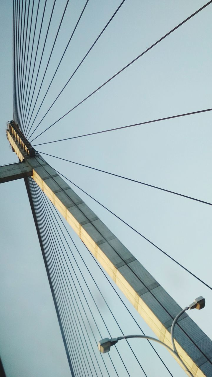 LOW ANGLE VIEW OF SUSPENSION BRIDGE