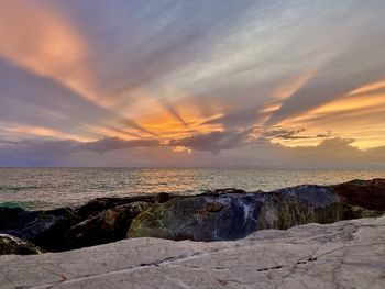 Scenic view of sea against sky during sunset