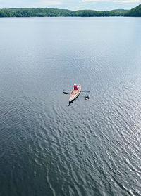 High angle view of boat in sea - seemingly alone.