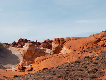 Scenic view of desert landscape against sky