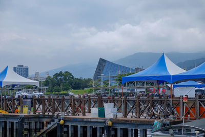 Bridge over buildings against sky