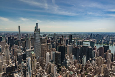 Aerial view of cityscape against sky