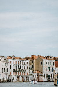 Buildings in city against sky