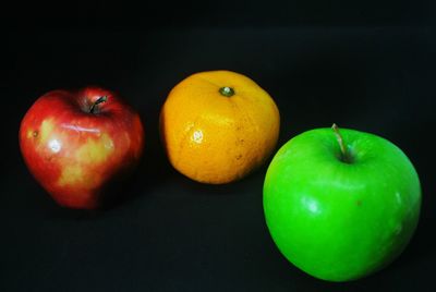 Close-up of apples on black background