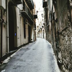 Road amidst buildings