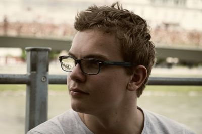 Portrait of young man looking away