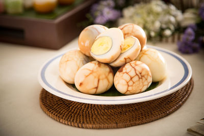 Close-up of tea eggs served on table