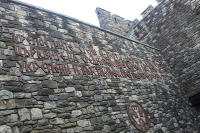 Low angle view of brick wall