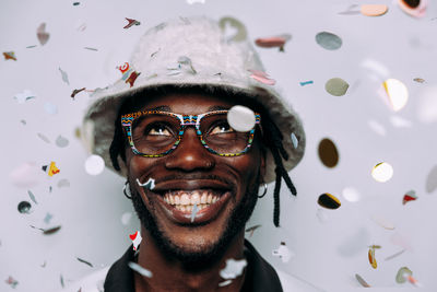 Close-up portrait of smiling young man