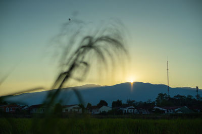 Scenic view of mountains against sky during sunset