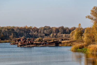 Scenic view of river against clear sky