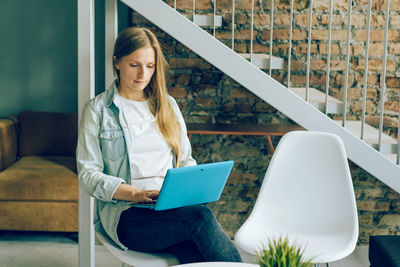 Woman sitting in a building