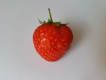 Close-up of strawberry against white background