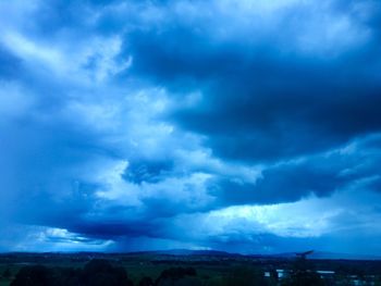 Storm clouds over landscape