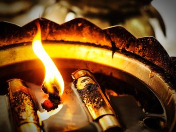 Close-up of burning diya