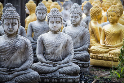 Close-up of buddha statues