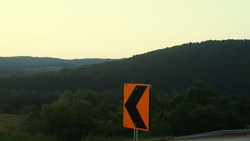Landscape with mountain range in background
