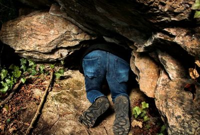 Low section of man on rock