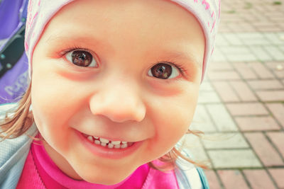 Portrait of cute girl smiling