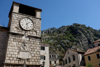 Clock tower in kotor against clear view sky