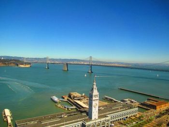 View of bridge against clear blue sky