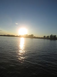 Scenic view of sunset over river