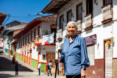 Senior woman tourist at the heritage town of salamina in the department of caldas in colombia