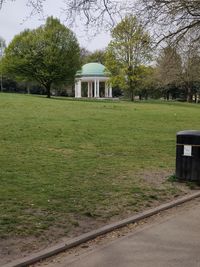 Built structure by trees in park